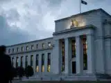Fed Surprises Markets, Gold Drops $40 and Bitcoin Slips Under $65,500